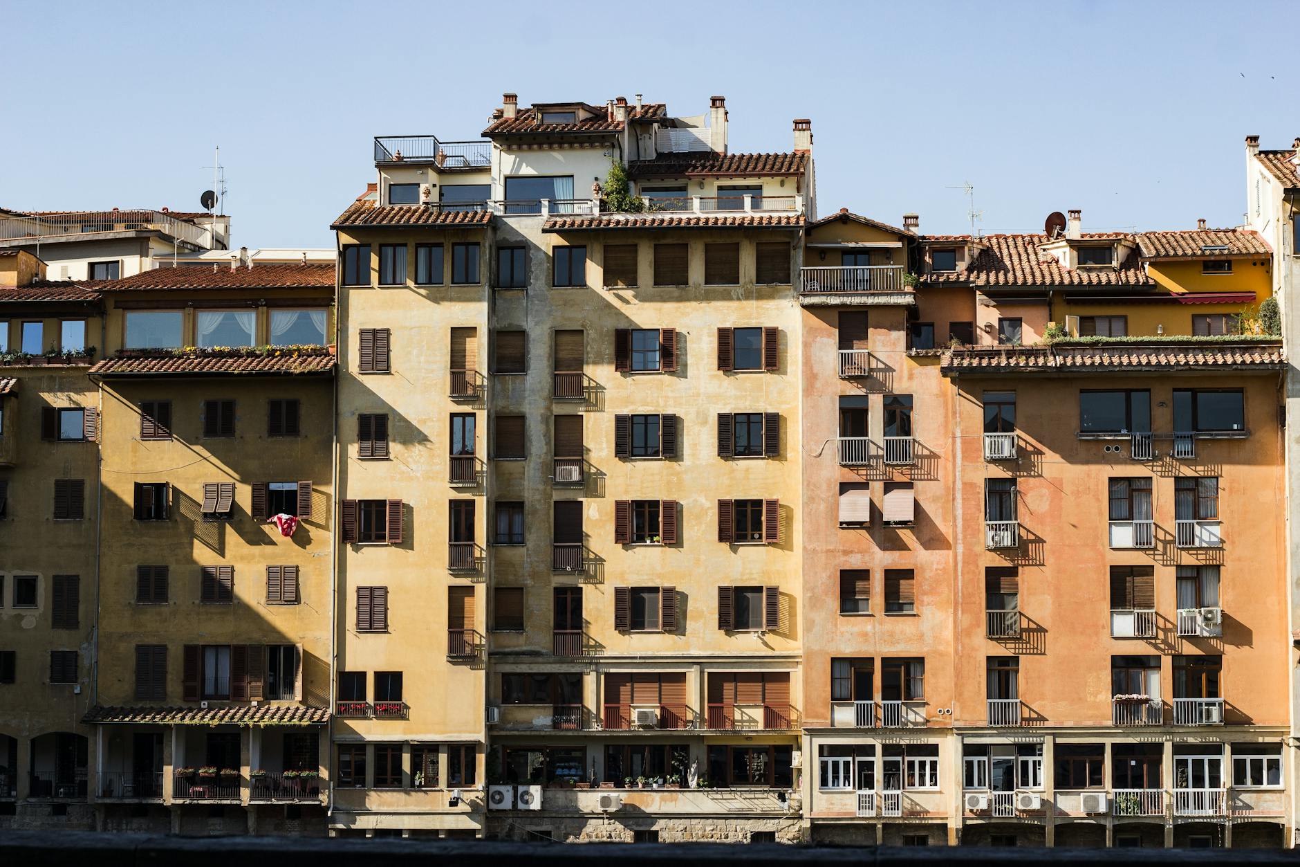 Colorful buildings and apartments along the Arno River in Florence