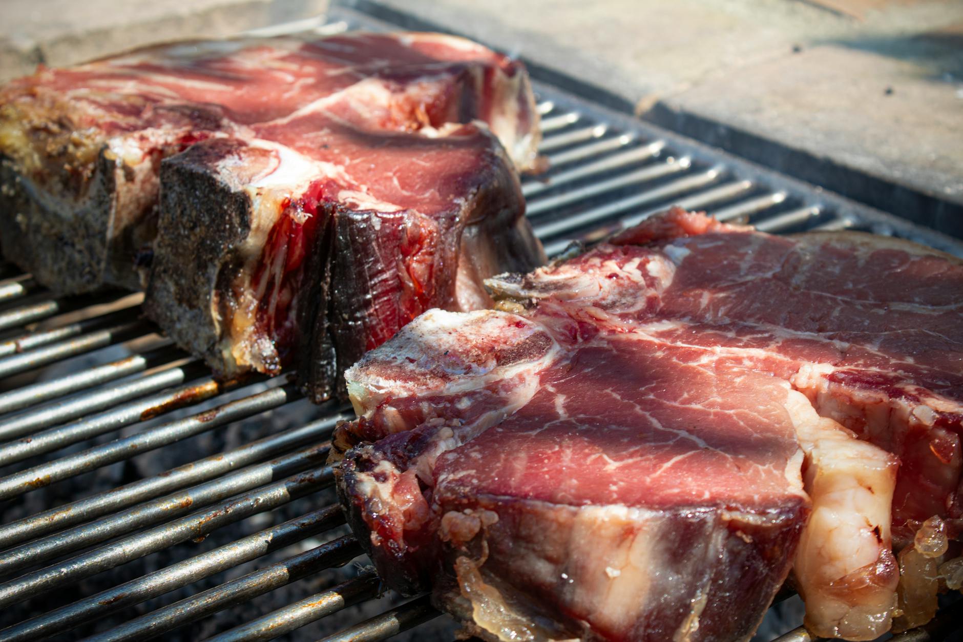 Bistecca alla Fiorentina traditional Tuscan T-bone steak grilled over wood fire
