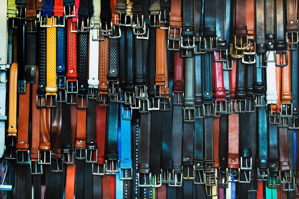Leather belts hanging in a Florence leather shop