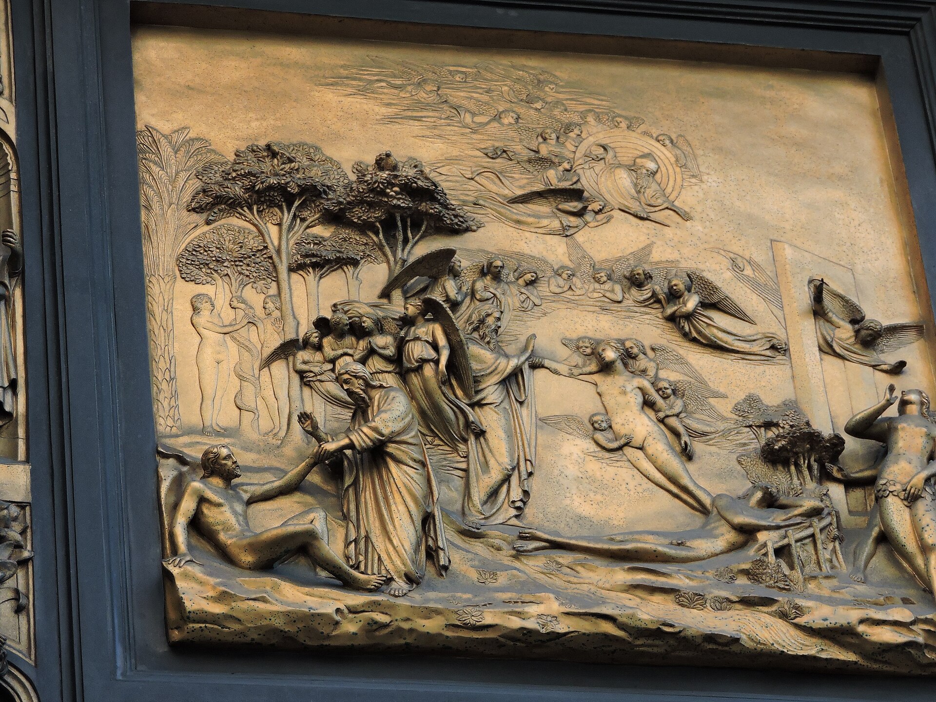 A gilded bronze relief panel from the Gates of Paradise on the Florence Baptistery showing the story of Adam and Eve