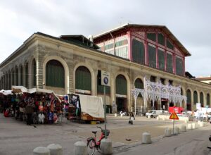 The Mercato Centrale in Florence in winter with the covered leather and clothing stalls of the San Lorenzo street market outside