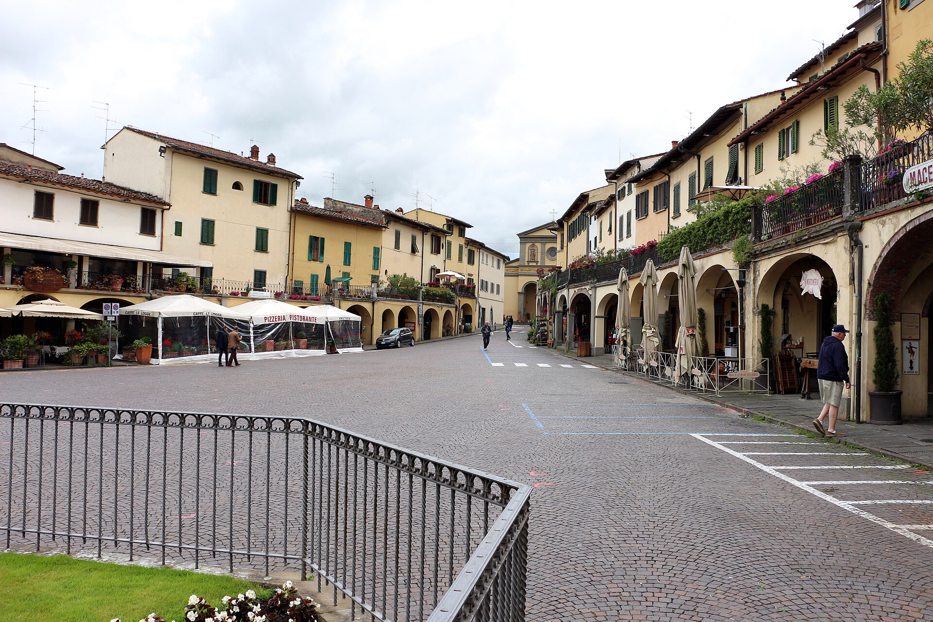 Piazza Matteotti in Greve in Chianti, the arcaded triangular main square