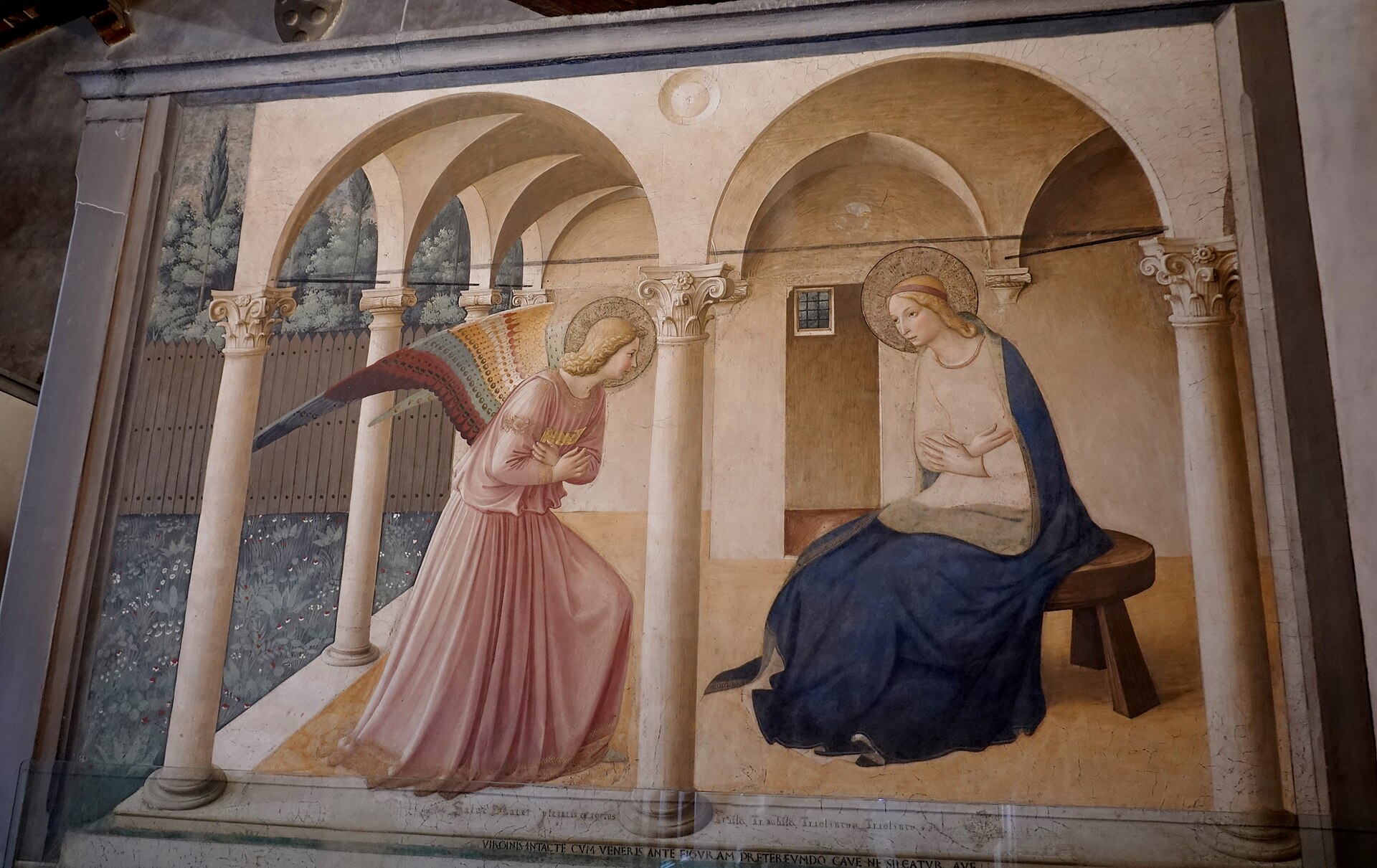 Fra Angelico's Annunciation shows Gabriel and Mary beneath painted arches on the wall of Florence's San Marco convent.