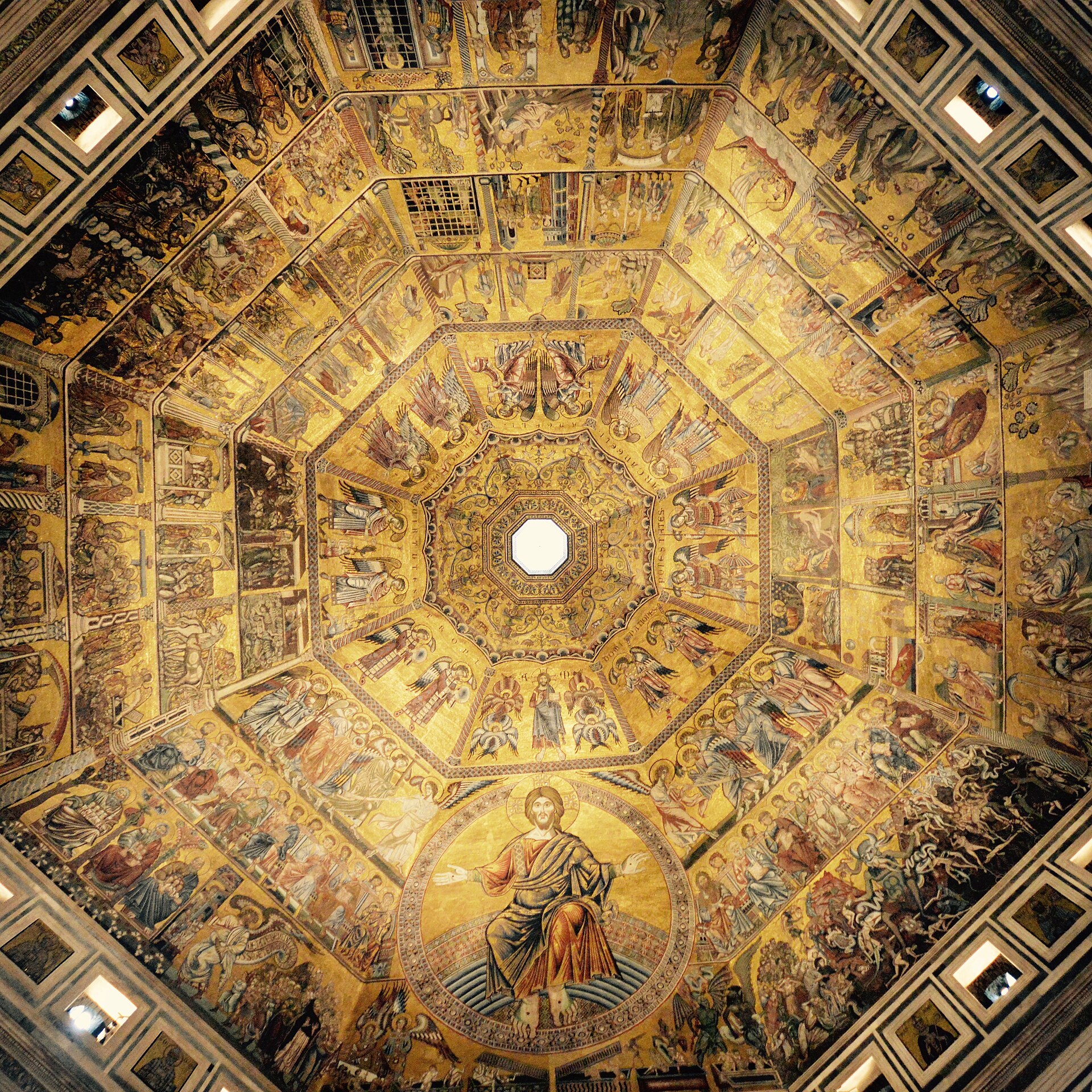 Gold mosaic scenes radiate around the octagonal ceiling of Florence's Baptistery, with a large seated Christ above the surrounding narrative panels.