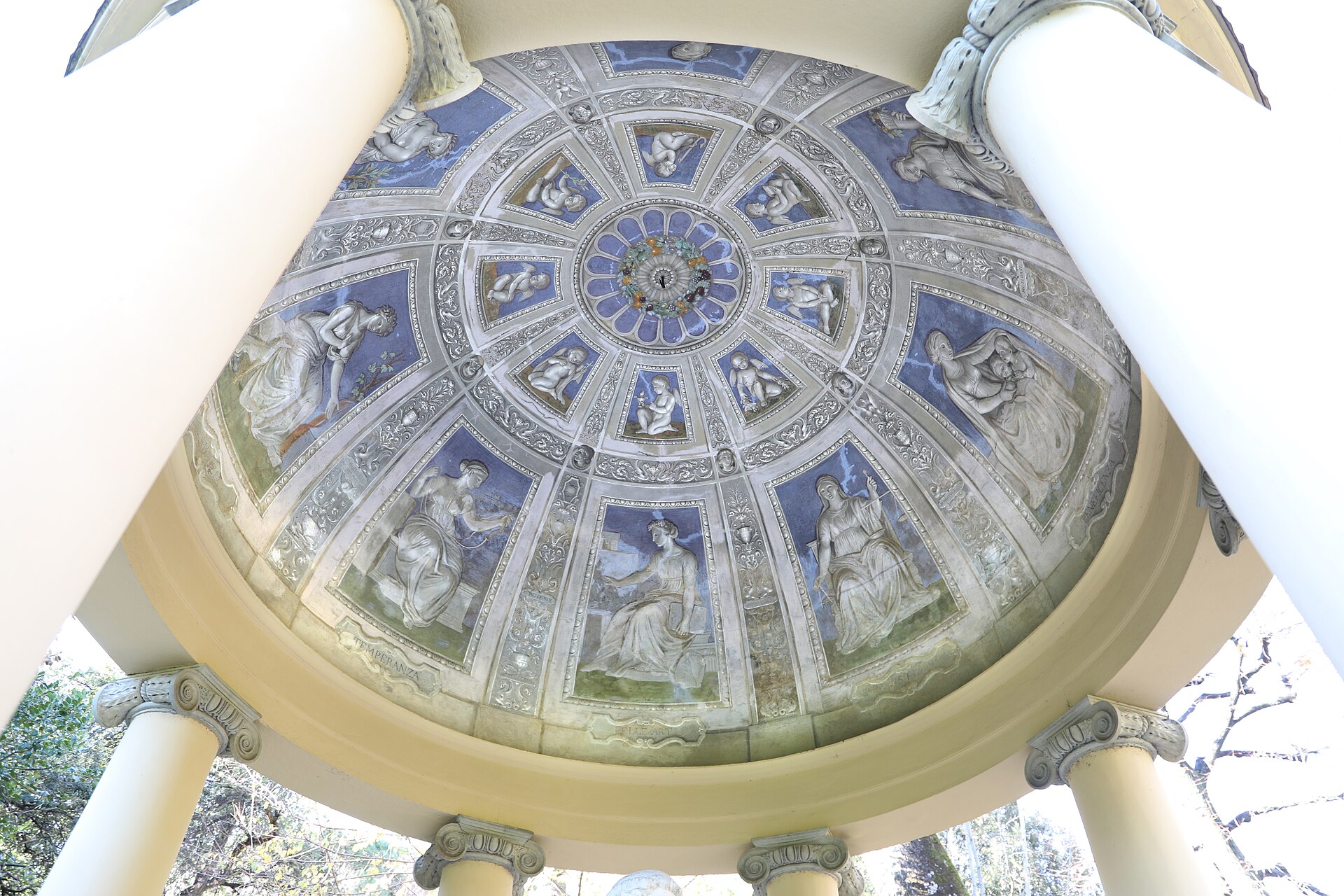 Painted figures fill the domed ceiling above pale columns in the garden pavilion at Palazzo della Gherardesca, Florence.
